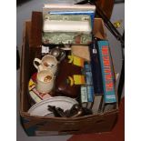 A box of miscellaneous to include Polaroid IE826 digital camera, bird books, cased cutlery etc.
