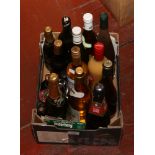 A box of bottled wines and spirits to include Claret de Die 2018, Lambrusco, Crabbies mulled