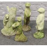 Four cast concrete garden models of Meerkats.