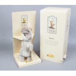 A boxed Steiff classic Pooh rabbit mohair soft toy.