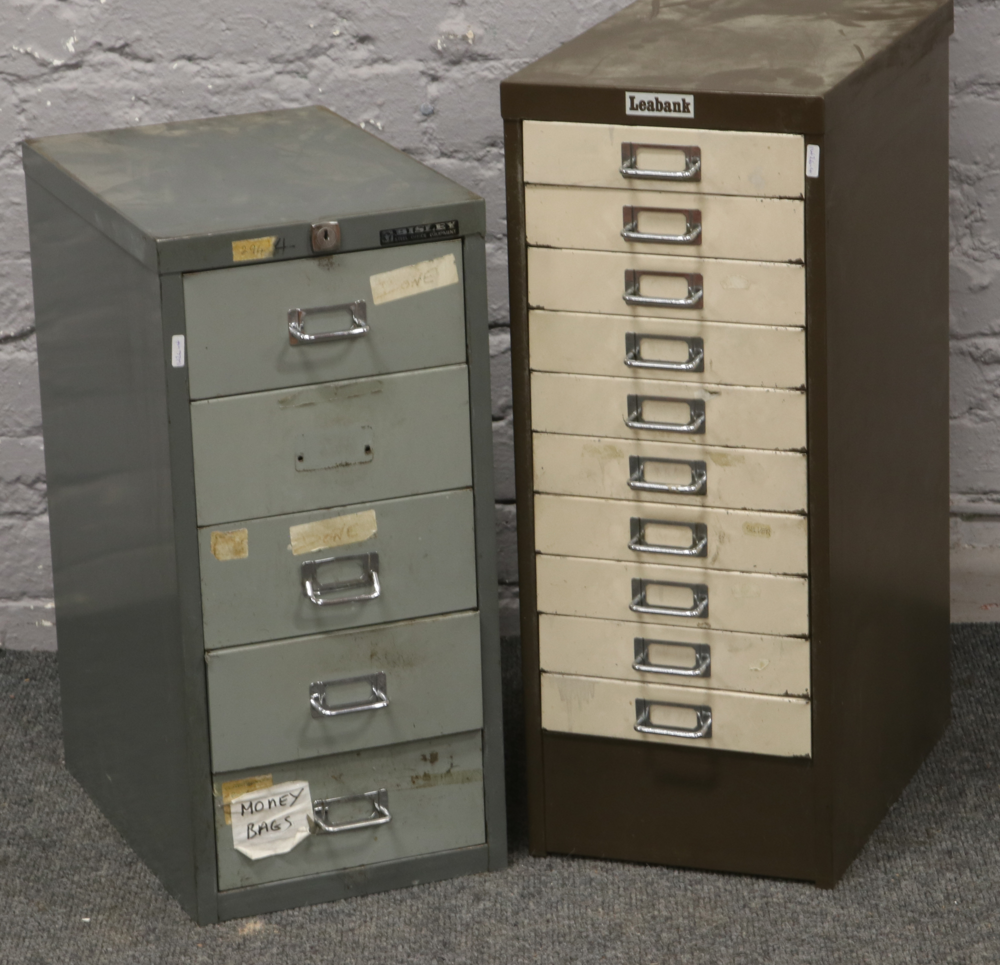 A Bisley steel office five drawer filing cabinet and another Leabank example.