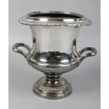 A 19th century silver plated wine cooler of campana form and with gadrooned mouldings.