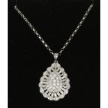 A 9ct white gold and diamond cluster pear drop pendant on chain.