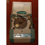 An Invicta stereophonic portable record player with BSR turntable.