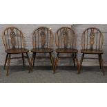 A set of four Ercol chairs with Prince of Wales design.