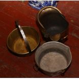 A large brass and iron jam pan brass helmet shaped coal scuttle, along with a aluminum cook pot.