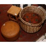 A large pot bellied log basket, two footstools and a pine stool.