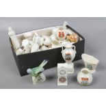 A box of assorted crested china.