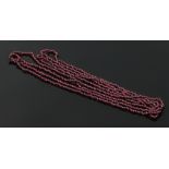 A garnet bead long guard chain.