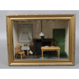 A gilt framed kitchen interior diorama with dolls house Yorkshire range, Belfast sink and