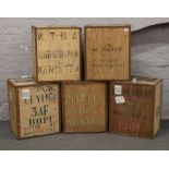 Five vintage tea chests with stencilled decoration.