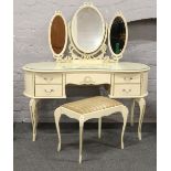 A painted Kidney shaped dressing table with triple fold mirror and stool, 131cm x 53cm.