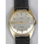 A manual gold plated Rotary wristwatch with second sweep finger date calendar and stainless steel