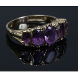 A 9ct gold five stone amethyst ring, size N.