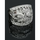 A 14ct white gold garland style diamond ring, size O.