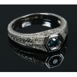 A 14ct white gold blue and white diamond ring with milgrain shoulders. Size O.