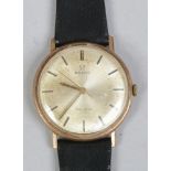 A gentleman's 9ct gold cased Omega Geneve manual wristwatch with satin dial, baton markers and