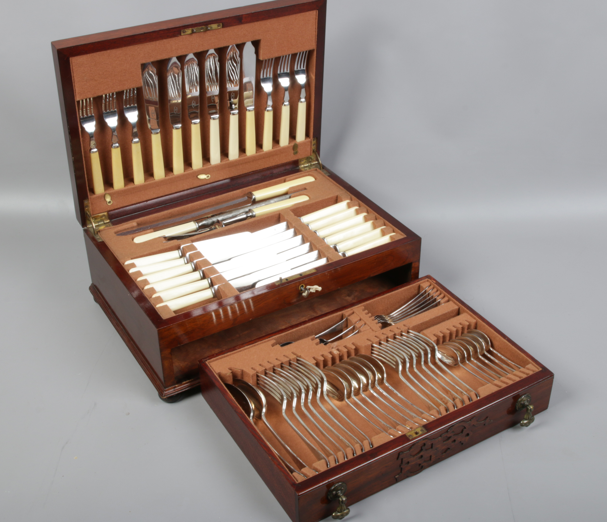 A mahogany canteen of silver plated cutlery William Hutton & Sons Sheffield.Condition report