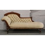 A Victorian chaise lounge with deep buttoned upholstery.Condition report intended as a guide only.