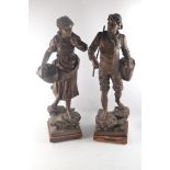 Pair of 19th century spelter figures by Rousseau 'Pecheur au filet' and 'Pecheus au filet' (