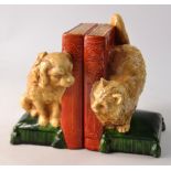 FABULOUS c1920s- 30s pair of bookends by Bretby featuring a cat and dog sat on cushions peering