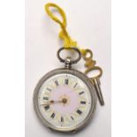 935 Silver cased pocket watch with key, roman number dial and rope twist gilt design