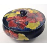 Willaim Moorcroft blue based lidded bowl with Hibiscus design