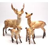 A BESWICK DEER FAMILY to include a Buck, Doe and 2 fawns