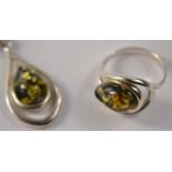 Silver stamped 925 Green amber ring, size N/O and a pendant