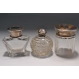 Three vintage silver topped toilet jars/bottles