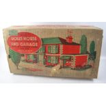 1950's 'Mettoy' metal dolls house and garage 10B