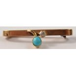 EXQUISITE 9ct gold brooch with a small diamond (.20ct approx) and a turquoise inset stone to