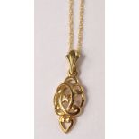 9ct pierced work necklace on chain.