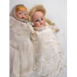 Two West German bisque head dolls