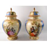 Pair of Victorian scene temple jars and covers with beige and blue ground and gilt highlight