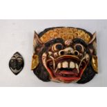 Wooden carved Chinese dragon face mask H: 27cm and stone carved face mask H: 11cm