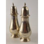 Pair of Sterling Silver condiments of baluster form, stamped 'Sterling, 6363 to base
