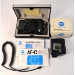 COLLECTABLE MINOLTA AF-C camera still in its original case, with 2 flashes, one in original box,