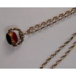 Late 19th century 9ct gold chain and trio of stones to include a birth stone, jet stone etc