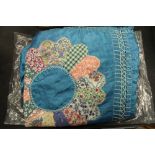 Silk Patchwork Cover with applique floral material in a Dresden plate design