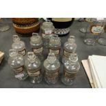 Group of nine Poison / Chemist's bottles and stoppers, each labelled