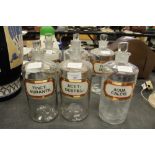 Six large Poison / Chemist's bottles and stoppers, each labelled