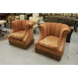 Pair of tub shape easy chairs - peach/gold floral cloth