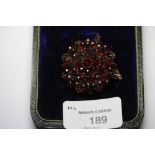 Victorian gilt metal garnet brooch