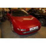 1990 Toyota MR2, Reg. G441 GVN, red, 146k miles, 2000 Twin Cam 16 engine, debadged, some paint chips