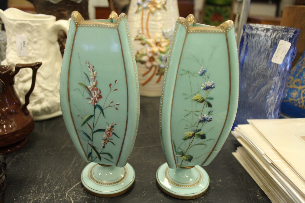 Pair of Victorian pale green opaque glass vases of Aesthetic design (one damaged)