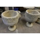 2 Mayan urns - circular planters decorated with Aztec design on circular base