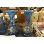 Pair of Victorian gilded blue glass vases of Mannerist design (both chipped)