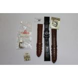 Three Omega brown crocodile leather style wristwatch straps, each with original clasps, a boxed