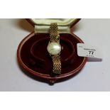 1950's ladies or boys Omega 9ct gold cased wristwatch, with silvered dial, movement No. 16733430,